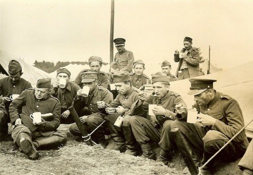 Captured Polish POW's Enjoy Food in German Camp; 1939.jpg