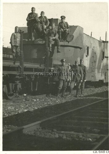 Soldiers with Polish booty, armored train, steam locomotive, Poland 1939.jpg